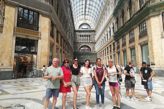 A group of tourists in naples on a walking tour.